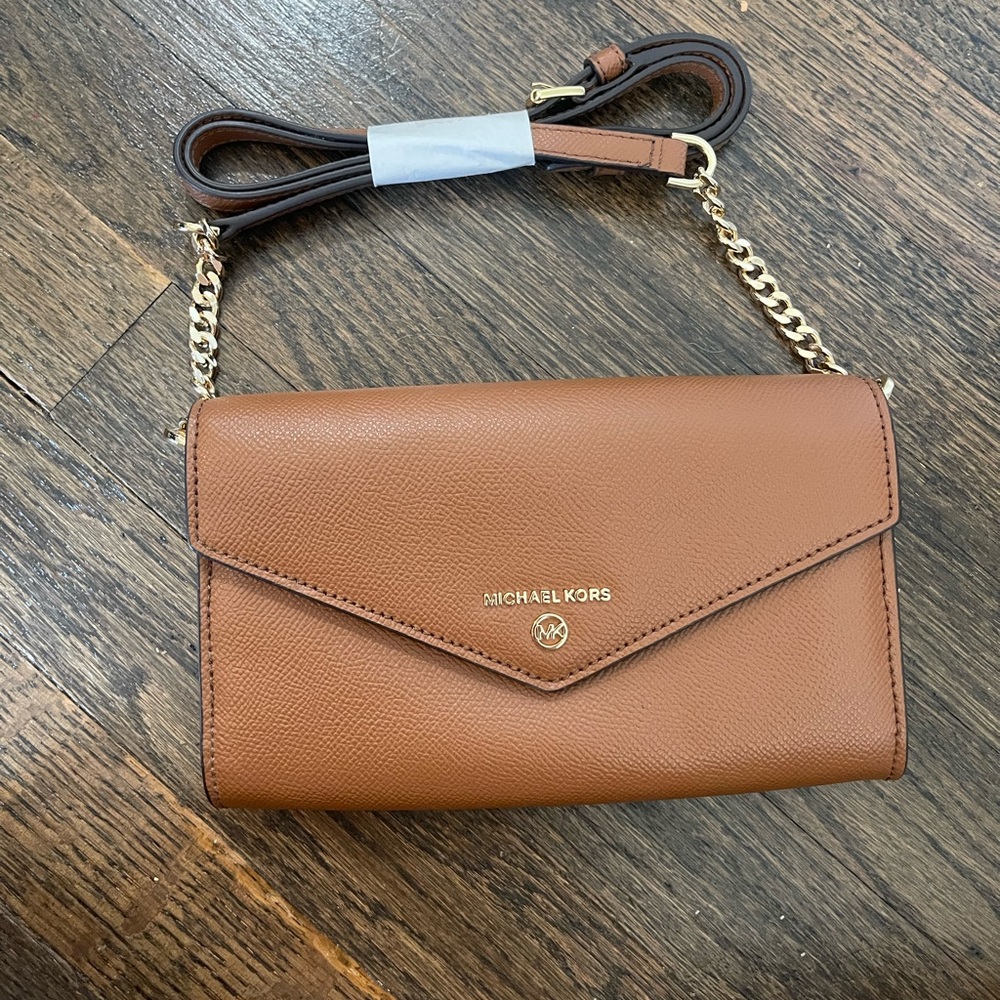 Michael Kors crossbody clutch, like new never used.